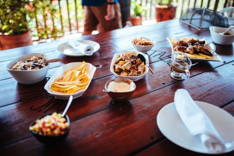 All About Jerk Cooking Class - Rum punch, cistern water, and the veranda meal with hummingbirds