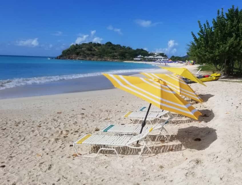 All-in-one day at Ffryes Beach with Swimming and Lunch Tour - Ffryes Beach setup: lounge time, painting, and jewelry choices