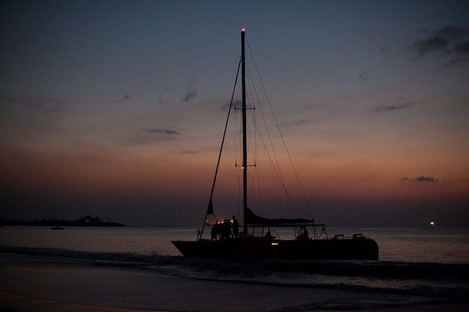 Antigua Sunset Catamaran Cruise From St. John's - Stop 1 at Dickenson Bay: where the views start and what the sailing feels like