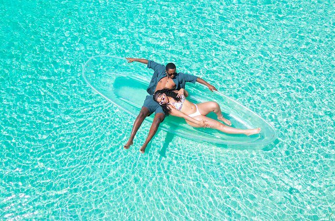 Crystal Clear Kayak Drone Photography Antigua - How the photographer and assistant guide your poses